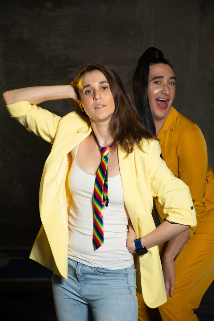 Two people dressed in yellow