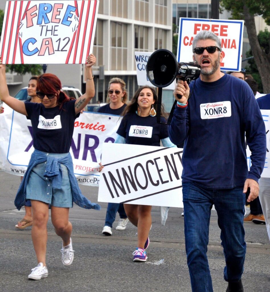 Marching to Free the California 12. From left: Dani Dauntless, Katherine Bonaguidi, Dana Garber, Justin Brooks. Photo credit: Heidi Brooks.